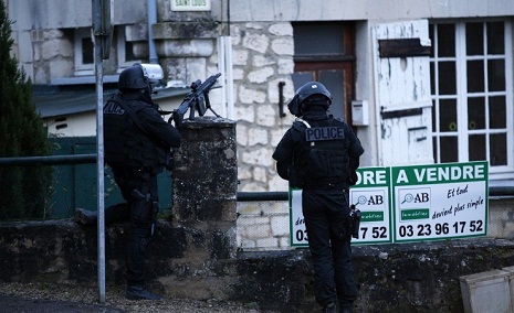 Suspected terrorists with hostages barricade themselves inside printing house north Paris